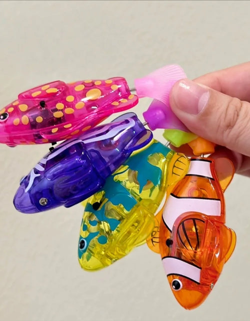 Load image into Gallery viewer, Baby Bath Light-Up Sensor Electric Small Fish Playing in Water Pet Fish Swimming Fish Can Swim Realistic Clownfish Toy
