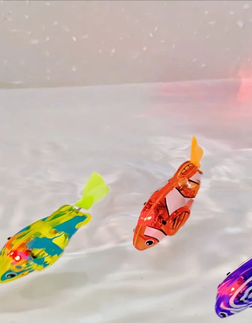 Load image into Gallery viewer, Baby Bath Light-Up Sensor Electric Small Fish Playing in Water Pet Fish Swimming Fish Can Swim Realistic Clownfish Toy
