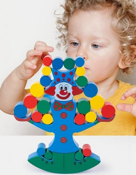 Wooden clown balancing blocks